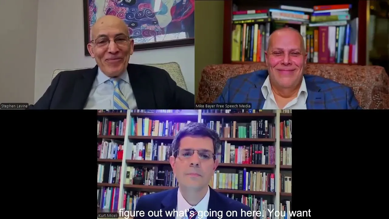Split-screen interview: a guest in a book-lined study and Mike Bayer in his own book-lined room